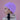 Woman wearing a lilac knitted winter hat from Bohemia Headwear